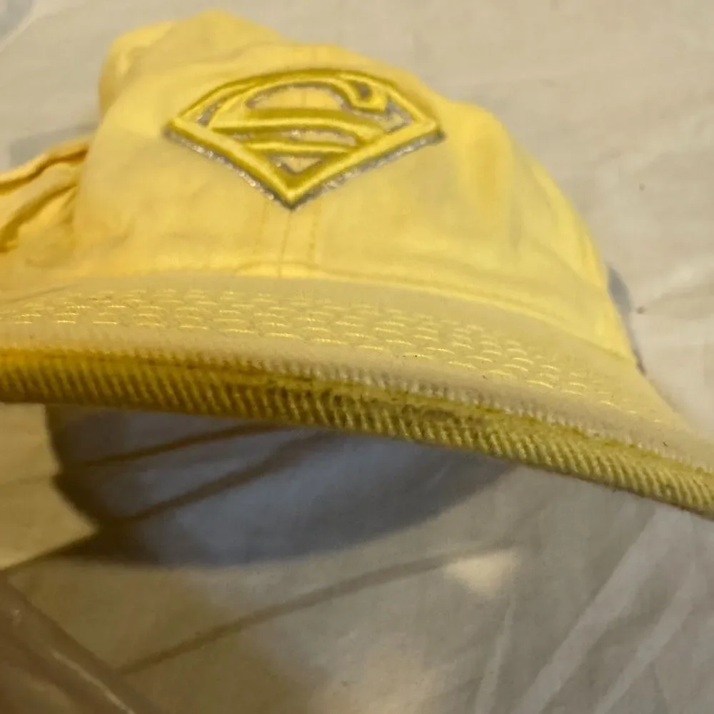 DC Comics Supergirl Hat Yellow Cargo Pocket Anoma Shield Cap AS IS FLAWED Stain